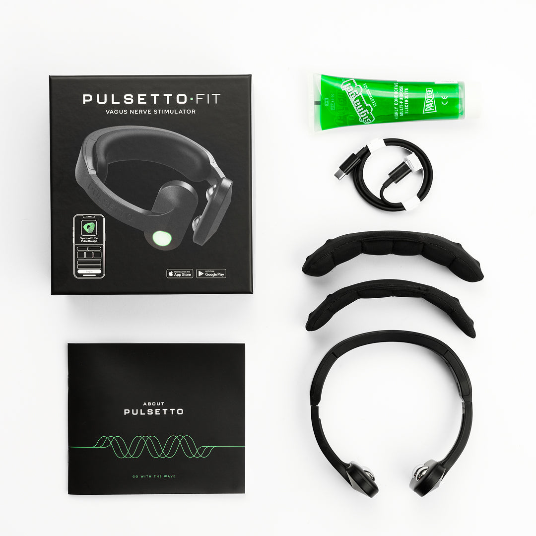 Pulsetto FIT box contents with device, conductive gel, USB-C cable and neck pads
