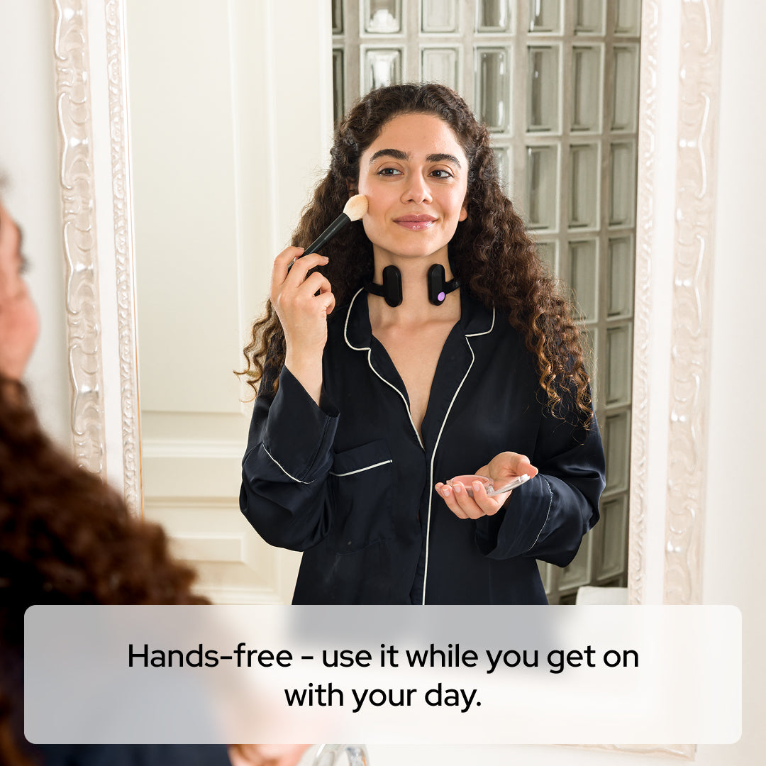 Woman wearing Pulsetto FIT hands-free during a daily routine