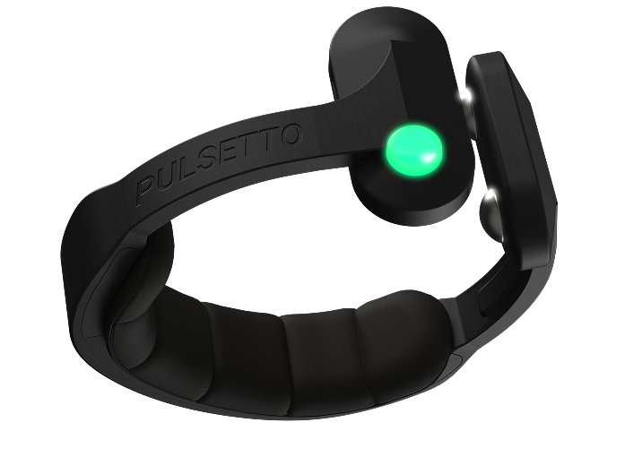 Person using Pulsetto to relax